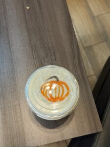 latte art of a pumpkin on top of cold foam 
